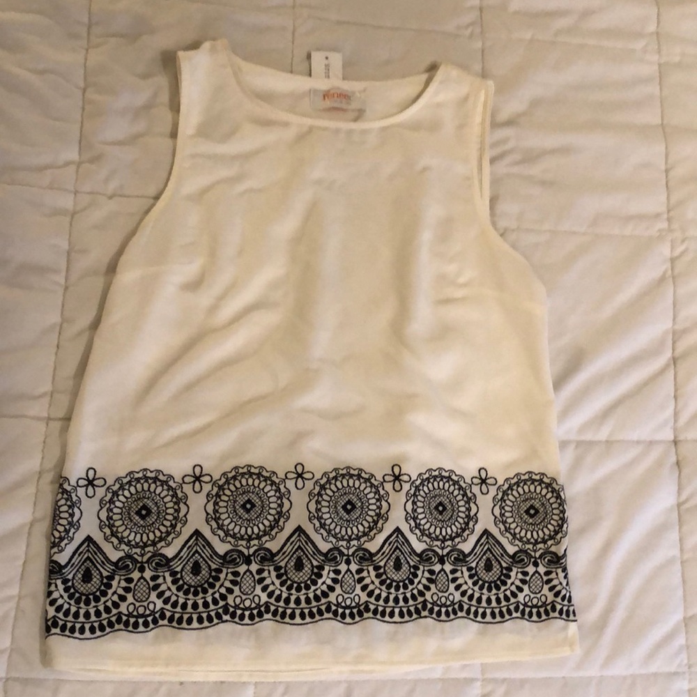 Renee C tank top blouse with embroidered detailing at hem. Size small.